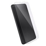 Three-quarter angled view device with screen protector hovering above screen.