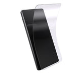 Three-quarter angled view of device with screen protector hovering above screen#color_clear