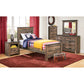 Trinell Panel Bed
